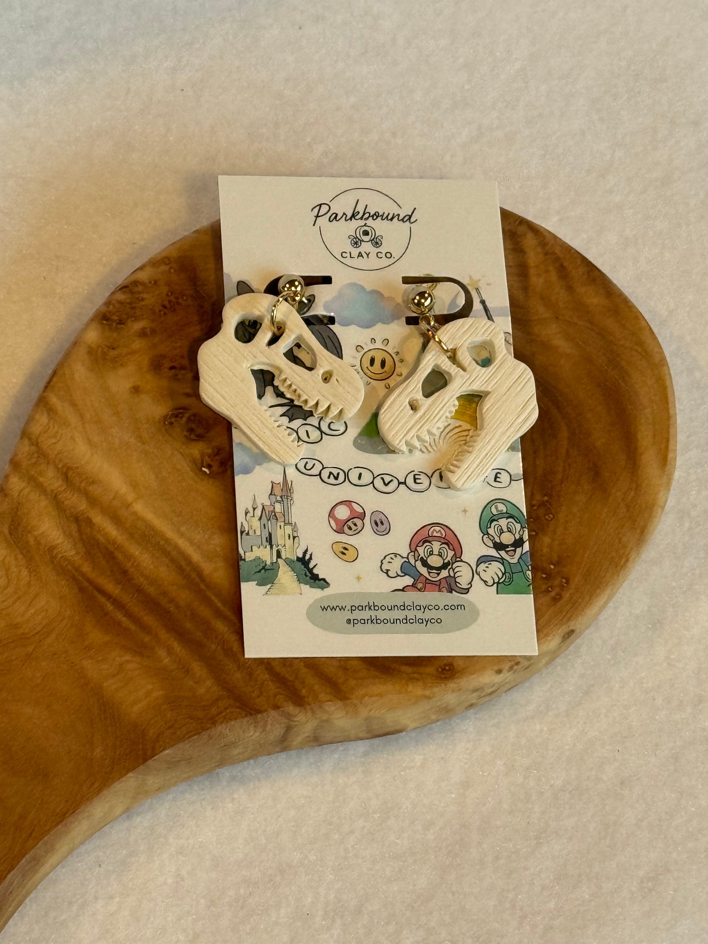 Jurassic Park Inspired Fossil Earrings | T-Rex Skull Dangles | Dinosaur Theme Park Style | Lightweight Polymer Clay Earrings